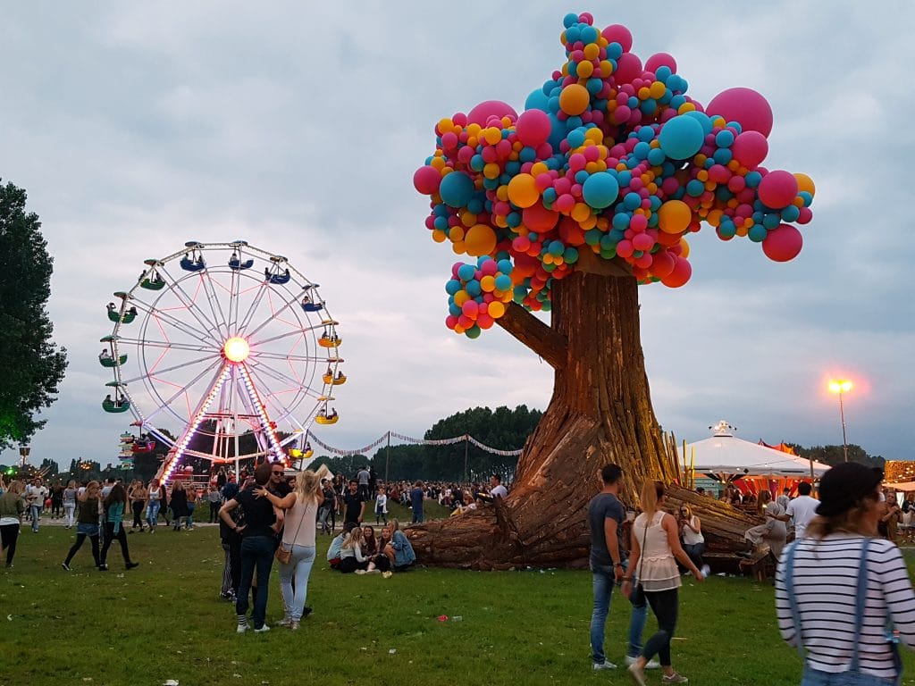 Balloon tree sculpture at outdoor festival