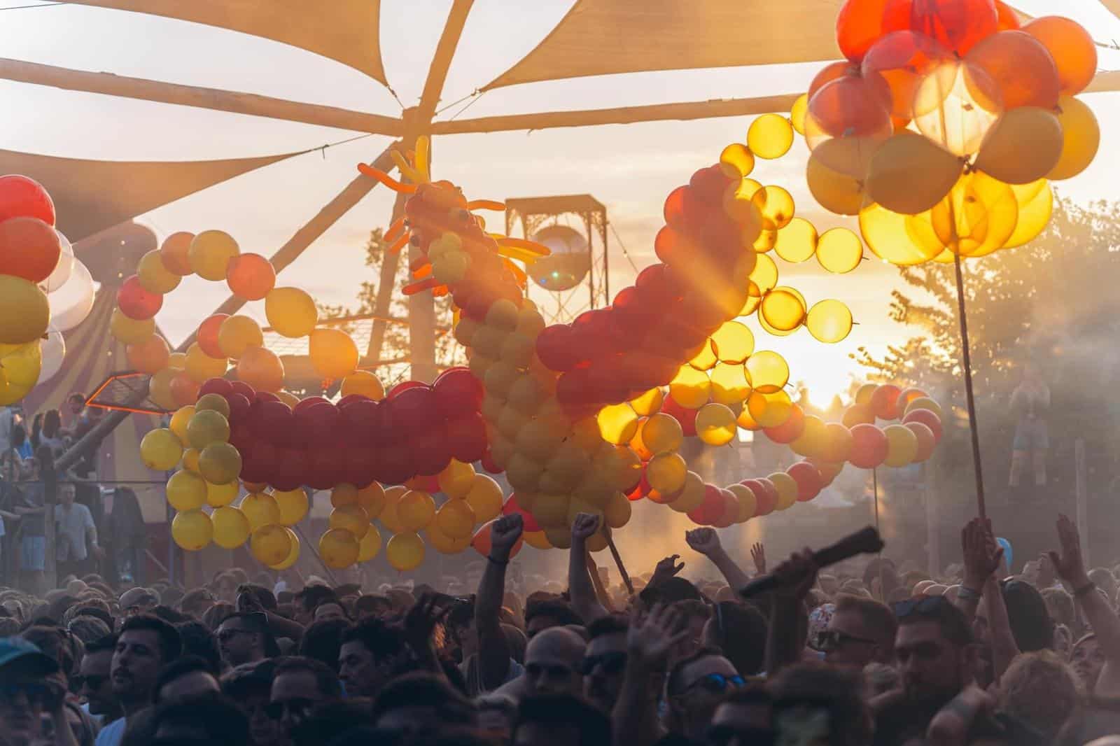 Phoenix sculpture and garlands at sunset at Thuishaven